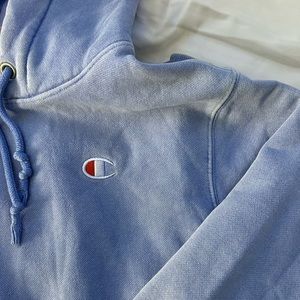 PERIWINKLE CHAMPION HOODIE. Size medium fits over sized.
